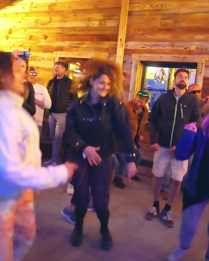 Dancers in the warm light of the mountain hut